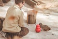 Barcelona, Ã¢â¬â¹Ã¢â¬â¹Spain, on May 2017 - Animal keeper feeding and playing with meerkat